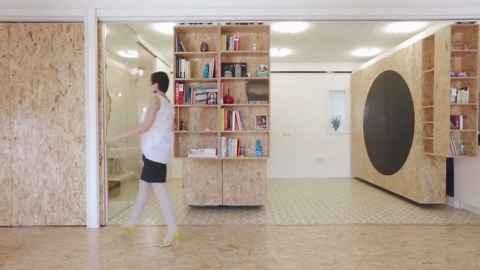 Sliding shelving unit combines five functions in one apartment