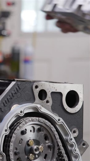 Cylinder head juggler? Not likely. But Evan Perkins does know that these Trick Flow Specialties DHC 200 aluminum heads may look like camel-back castings, but with CNC ports the aluminum heads will offer big power for the 435ci Chevrolet small block we’re building with @summitracing. 📲 Watch the full video on our YouTube! #builtwithsummit #chevy #smallblock | Hemmings