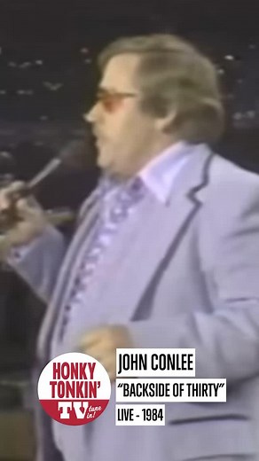 Released in 1979, John Conlee’s “Backside of Thirty” was a breakout hit that captured the working man’s blues. The former mortician-turned-country singer delivered it with a weary honesty—singing about lost youth, a failed marriage, and a life stuck between dreams and disappointment. The song climbed to number one on the Billboard Hot Country chart and cemented Conlee’s reputation for real-world storytelling. Its plainspoken lyrics and worn-in vocals made “Backside of Thirty” an anthem for folks