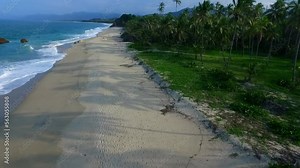 secret beach, in the middle of the atlantic ocean in santa marta colombia, blue sea and green mountains