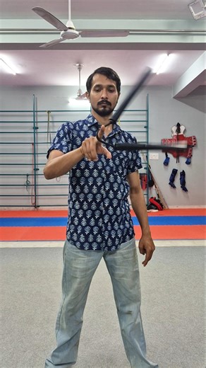 Nunchaku finger roll Tutorial #martialarts #shorts #nunchaku