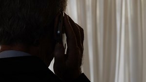 clip-1039191770-phone-tapping-man-speaks-shade