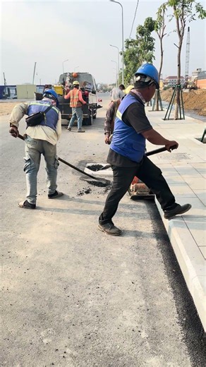 adjustment asphalt commercial street around curb