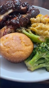 beef ribs glazed in bourbon BBQ sauce, served with cheesy baked macaroni, broccoli & corn muffin