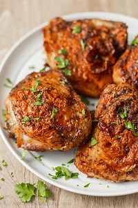 Our Air Fryer Chicken Thighs are juicy on the inside and perfectly seasoned and crispy on the outside...Recipe in Comments | NatashasKitchen.com