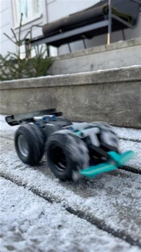 LEGO pull-back car sliding in snow