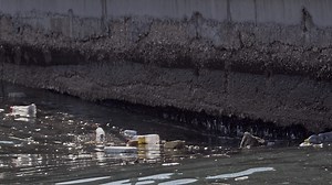 Plastic Pollution Trash Sea Garbage Floats in Ocean Footage.