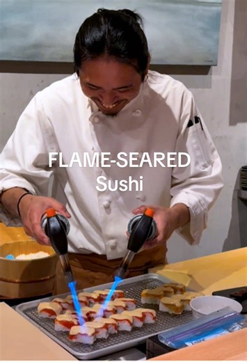 Aburi sushi being flame-seared at Syu Kitsilano 🔥🍣 One of Vancouver’s newest sushi restaurants in the heart of Kitsilano. #SyuKitsilano #AburiSushi #VancouverSushi #Kitsilano #japanesefood
