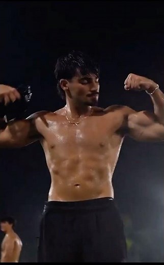 GIf hot men flexing muscle