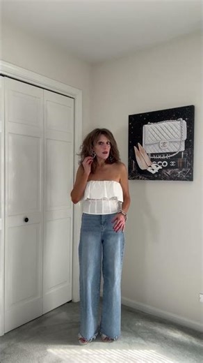 White Ruffle Strapless Top Light Wash High Wasted Denim White Silver Heels Silver Accents
