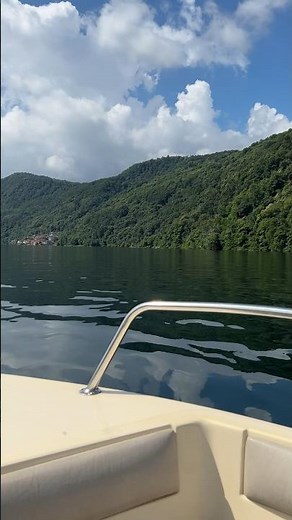 The calm waters of the lake and the ancient medieval village