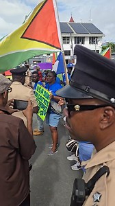 Police trying to move supporters of WIN and set up barriers around Parliament Building. | Prime News Guyana