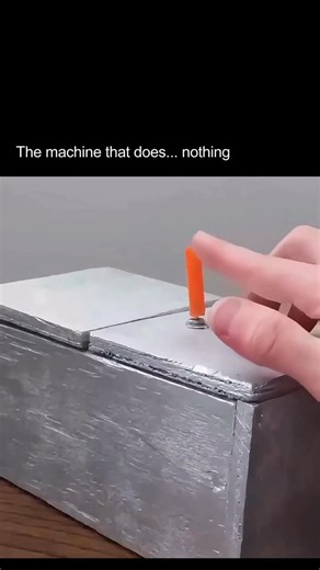 AI News | Tech | Human Impact on Instagram: "Some inventions push humanity forward. Others remind us to stop… and think. This video shows one of the strangest and most beautifully pointless creations in engineering history: the “useless machine.” Originally conceived in 1952 by Marvin Minsky at Bell Labs one of the founding minds of AI these machines are intentionally designed to perform absolutely nothing useful. You flip a switch… A tiny door opens… A mechanical arm pops out… And its only purp