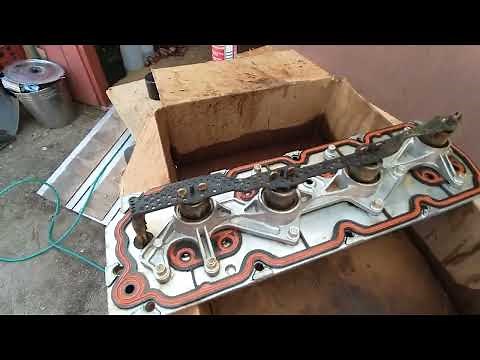 Chevy 5.3L Valley Pan Cover cleaning and solenoids explained.