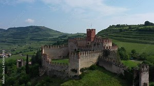 Aerial view, point of interest on Soave castle, province of Verona, Italy. Italian historic castles. The famous medieval castle on the hill. Aerial panorama of the castles of Italy.