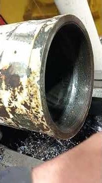 Machining repairs to a track adjuster cylinder.