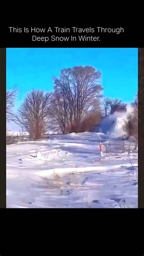 explain on Instagram: "This Is How A Train Travels Through Deep Snow In Winter. Trains travel through deep snow in winter using specialized techniques and equipment. In extremely cold weather, a light dusting of snow can make the rail slippery, reducing train speed, especially on uphill grades. Heavy snow can also affect train handling by getting packed into the brake rigging, which can freeze into ice and become problematic. To mitigate these issues, trains may operate with modified braking sys