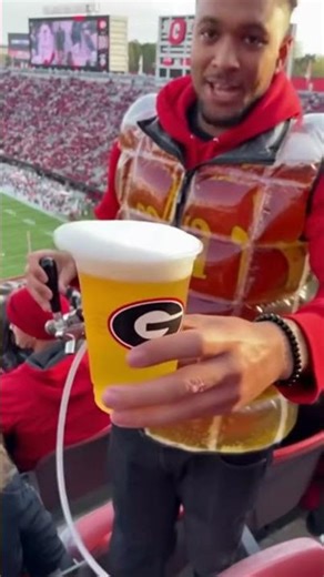 Student Wears Beer Jacket at Georgia Football Game