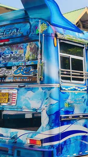 Brightly Decorated Blue Bus with Intricate Designs