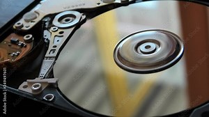 hard disk writing data with its head.