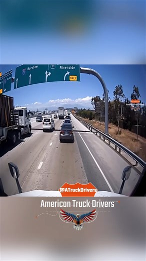 Car passes semi through blind spot using emergency lane — risky and reckless move #AmericanTruckDrivers #BlindSpot #EmergencyLane #RecklessDriving #Highway | American Truck Drivers
