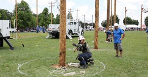 HURT MAN RESCUE! Yesterday we showed you the flag raising ceremony from the Tennessee Valley Lineman Rodeo. One of the events in the rodeo is the Hurt Man Rescue, where a lineman must climb to the top of a utility pole and safely lower a simulated injured co-worker. Here's a clip of one of the HU team members performing this task in the competition. | Huntsville Utilities