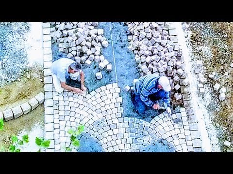 LAYING COBBLES, TRADITIONAL ARC PATTERN, NATURAL CUBE STONES, CARPET TECHNIQUE, GRITSTONE SETTS PRO
