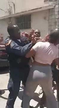 Cop slaps woman during altercation in Central Kingston