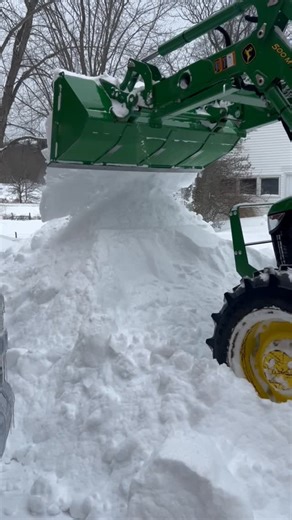 @noursefarm on Instagram: "Just moving the snow around to be able to dig out the cars. There certainly is a lot of it at the moment 🥶❄️🌨️ #farmerlife #TractorLife #Snowstorm #Farm #noursefarm"