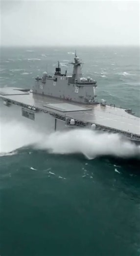 Warship Navigating Through Rough Seas 🌊