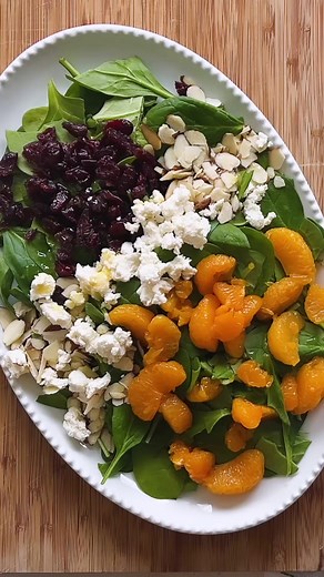 Need some sunshine right now? Try our light & flavorful Mandarin Orange Salad with Creamy Citrus Dressing! Recipe here: https://thrivinghomeblog.com/cranberry-spinach-salad-with-creamy-citrus-dressing/ This colorful salad includes baby spinach, dried cranberries, almonds, feta or goat cheese, and mandarin oranges and pairs perfectly with our homemade dressing. Serve on special occasions or on any weeknight! #eatyourgreens #healthysalad #spinachsalad #saladinspiration #healthyeating #eatclean | T