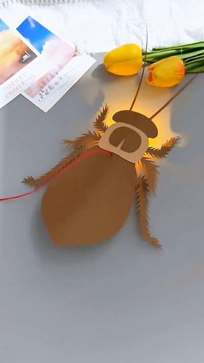 Instadiyou on Instagram: "Create a realistic and fun paper cockroach using just a few simple materials. This engaging DIY project is perfect for those who love crafting and want to try something unique. Follow the easy steps to fold and assemble your paper cockroach, and impress your friends with your creative skills. Discover more innovative craft ideas on my Instagram Reels: @craftycreations. #papercockroach #diyprojects #creativecrafts #handmadefun #diymaker #simplediy #diyideas #craftingcomm