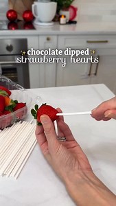 chocolate dipped Strawberry hearts 🍓🍫 So cute for a special Valentines treat! What You’ll Need: * Fresh strawberries * Lollipop sticks or wooden skewers * Your favorite chocolate (milk, dark, or white—your choice!) * Sprinkles for that extra pop of color (optional!) * A parchment paper-lined tray for setting Instructions: 1. Prep the Strawberries: Gently wash and dry your strawberries, leaving the green leaves attached for easy handling. 2. Melt the Chocolate: Slowly melt your chocolate of cho