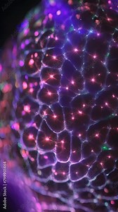 representation of a part of a cell with synaptic connections shinning magnified on microscope