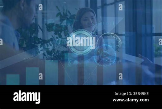 Business people sitting at laptops in an office, going through paperwork Stock Video Footage - Alamy