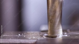 Shot of a drilling machine rotation at the workplace of a toolman locksmith, UHD 4k macro video Stock Video