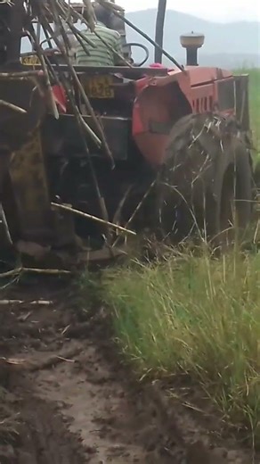 EXTREME FARM RESCUE – Tractor Pulls Heavy Load Out of Mud!