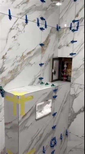 Hidden wall access panel covered with tiles — Utility hatch door for bathroom shower toilet bathtub