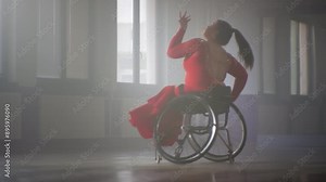 Female wheelchair dancer performing beautiful elegant choreography at a dance studio, full shot. Disability sport concept. Stock Video