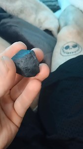 What is this? Just a magnet or a meteorite, or magnetized rock of some sort. Or it could be a flaming chunk of poopie that feel out the sky So I was at work fixing a excavation bucket. It had sand/dirt stuck to it from where ever it was digging. As I was inspecting the welds for cracks I found this magnet rock looking thing stuck to the bottom under all the sand/dirt. | Jay Sebastian