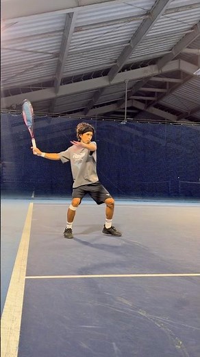 He's trying his best to hit the ball.