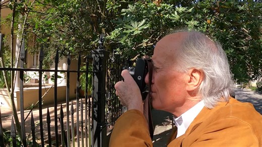 Why did a New Orleans photographer take 20,000 photos of Garden District homes?