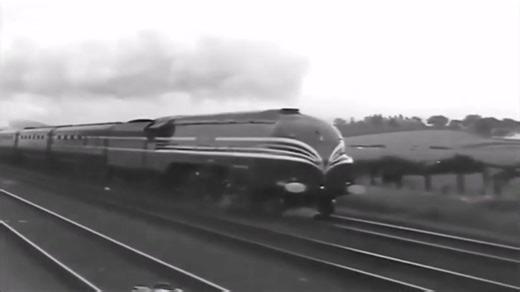 The LMS Coronation Class were true kings of the rails. Designed by Sir William Stanier in the 1930s, these streamlined Pacifics were built for speed, power, and elegance — hauling prestigious express trains like the Coronation Scot. In their striking blue and silver livery, they became symbols of luxury and modernity, even breaking speed records with runs over 114 mph. Later, many were repainted into classic LMS crimson lake and BR green, but their reputation as some of the finest steam locomoti