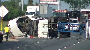I-55 lanes in suburbs closed due to rolled over semi truck; traffic 'jam packed'