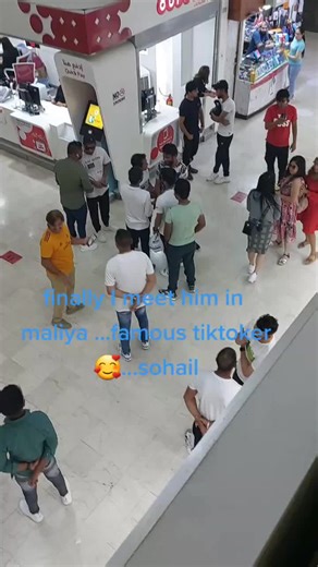 Casual Gathering in a Shopping Mall Environment