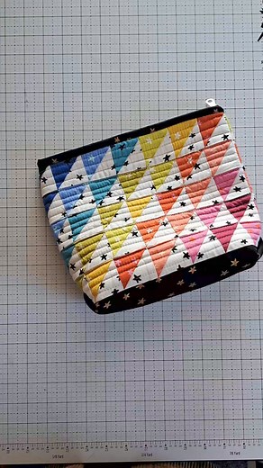 Snippets from making a Bristol Pouch. The Bristol Pouch was one of the first pouch patterns I released and it's just darling made up with half square triangles in these scrappy Starry fabrics from @missouriquiltco. I made this pouch at a quilting retreat I attended last week, and it was so much fun to revisit an older pattern of mine. If you're wanting to try a new pouch pattern, check out the link in the comments and use the code BRISTOL20 to save 20% off the pattern through the end of the week