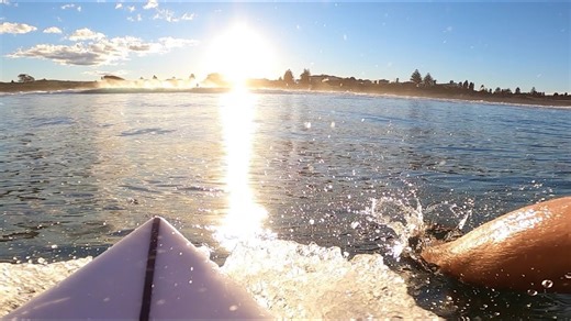 Catch the Beauty of Sunset Surfing with Stunning Moves