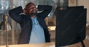Computer, success and relax with a mature CEO in the office at night to finish a task during overtime. Business, smile and management with a happy corporate professional or boss in the workplace