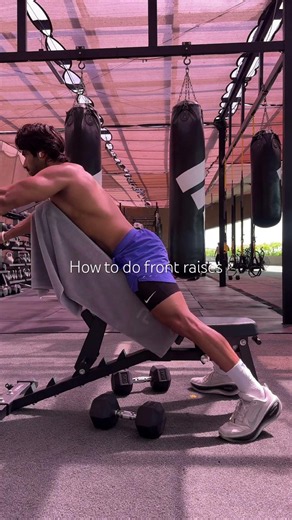 How to do front raises on Bench with Dumbbells
