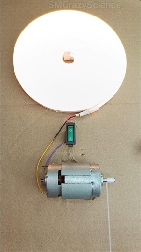 Turning a 775 DC Motor into a Generator to Power a Neon Heater Light _ #shorts #dcmotor #generator